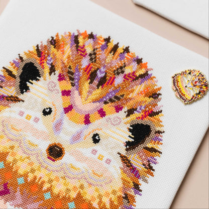 Mandala Hedgehog counted cross stitch kit with colourful threads and stitching accessories